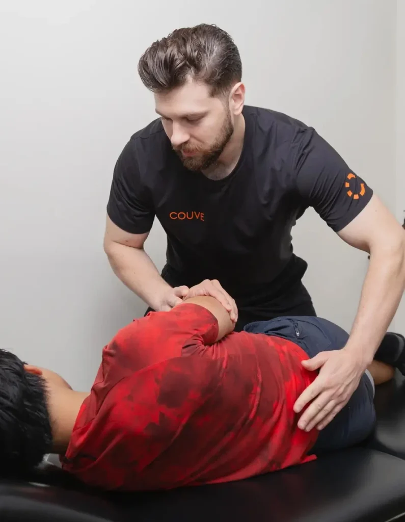 Vancouver Chiropractor 1 Nicholas Helping Patient