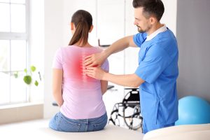 Chiropractic and physiotherapy care - what is the difference? Image of chiropractor adjusting patient's back