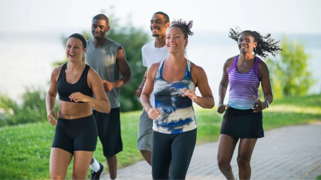Group of active people jogging